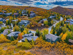 Aerial view of residential area featuring mountains