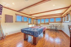 Playroom with beamed ceiling, billiards, and recessed lighting