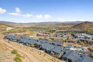 Aerial view of Apex Private Residences featuring the ski in/ski out access and Canyons Village below.