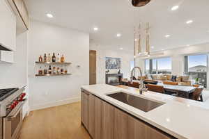 View from back corner of kitchen towards the dining and great space.