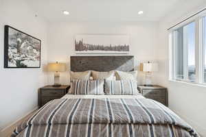Primary bedroom with en suite. Accented with gorgeous Park City artwork.