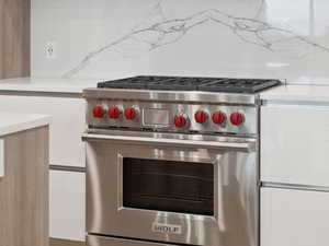 Kitchen featuring a 6 burner Wolf Range