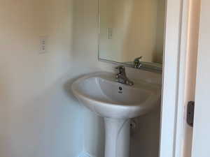 Pocket Bathroom featuring a sink (1st floor by kitchen)