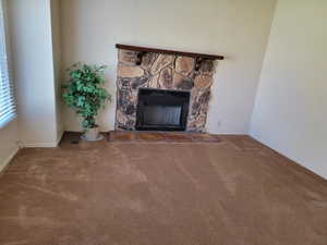 Spacious Living Room with Box Bay Window, Fireplace and Vaulted Ceilings