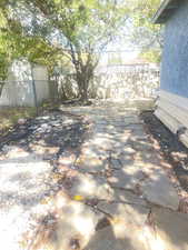 View of fenced backyard