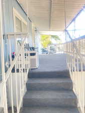 Stairs featuring expansive windows