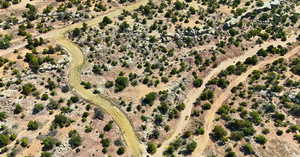 Aerial view of sparsely populated area with a desert landscape