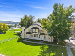 View of front of property featuring stucco siding and a mountain view
