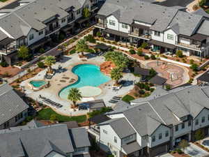 Aerial perspective of suburban area with a pool