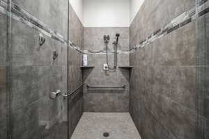 Full bathroom with tiled shower