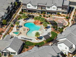 Aerial perspective of suburban area with a pool