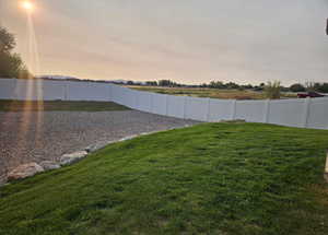 View of fenced backyard