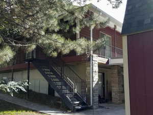 View of property with stairway