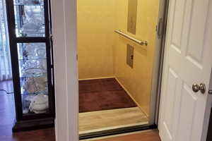 Elevator with wood finished floors
