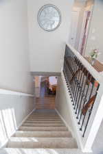 Stairs featuring baseboards