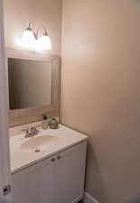 Half bathroom with vanity