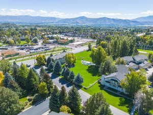 Aerial view of residential area with a mountainous background