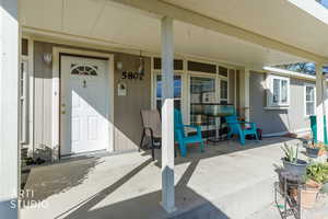 Property entrance with a porch