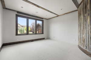 View of carpeted 2nd bedroom on the main floor.