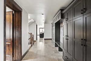 Entry Hall from Garage with Lots of storage cabinets