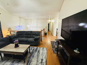 Living area featuring light wood-style flooring