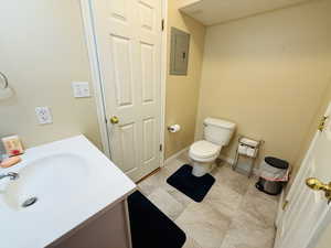 Bathroom with vanity and electric panel