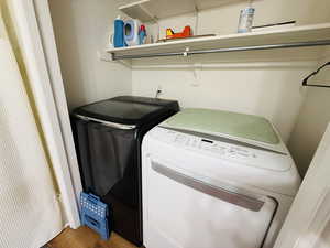 Washroom featuring wood finished floors