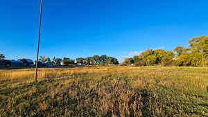 View of yard with a view of countryside