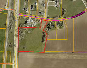 Aerial overview of property's location featuring property boundaries highlighted