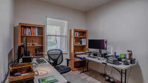 Office area with light colored carpet