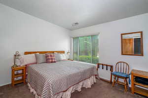 Bedroom featuring carpet