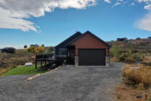 Garage featuring driveway