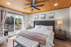 Bedroom featuring recessed lighting, wood finished floors, ceiling fan, access to outside, and wood ceiling