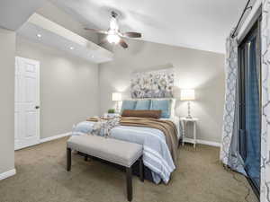 Carpeted bedroom featuring vaulted ceiling, recessed lighting, and ceiling fan