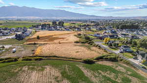 Aerial view of residential area with mountains
