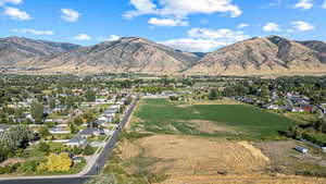 View of mountain background featuring nearby suburban area