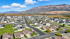 Aerial perspective of neighborhood area with mountains