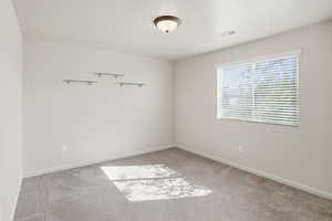 Guest bedroom at front of the home, amazing natural light