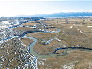 Overview of rural landscape with a mountain backdrop