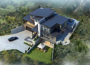 View of subject property with a forest