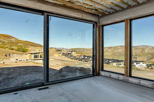 Detailed view of a mountain backdrop and a residential view