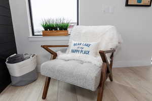 Living area with light wood-style flooring