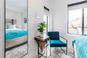 Bedroom featuring baseboards