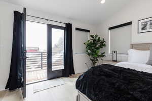 Bedroom with lofted ceiling, access to outside, light wood-style flooring, and recessed lighting