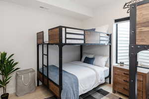 Bedroom with light wood-type flooring