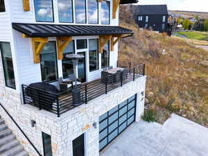 View of patio featuring driveway