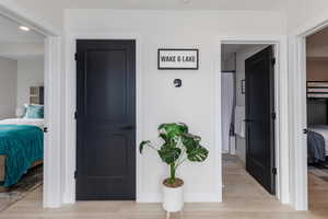 Bedroom featuring light wood-style flooring and recessed lighting