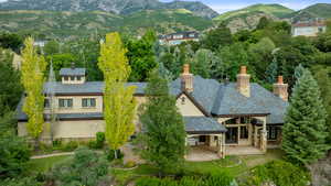 View from above of property featuring a mountainous background