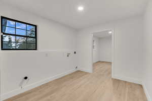 Laundry space off the kitchen, office through this doorway