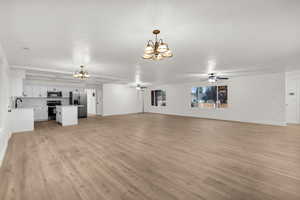 Front room, great room, all new floors, new kitchen, new paint, new textured ceiling, all done with contractors